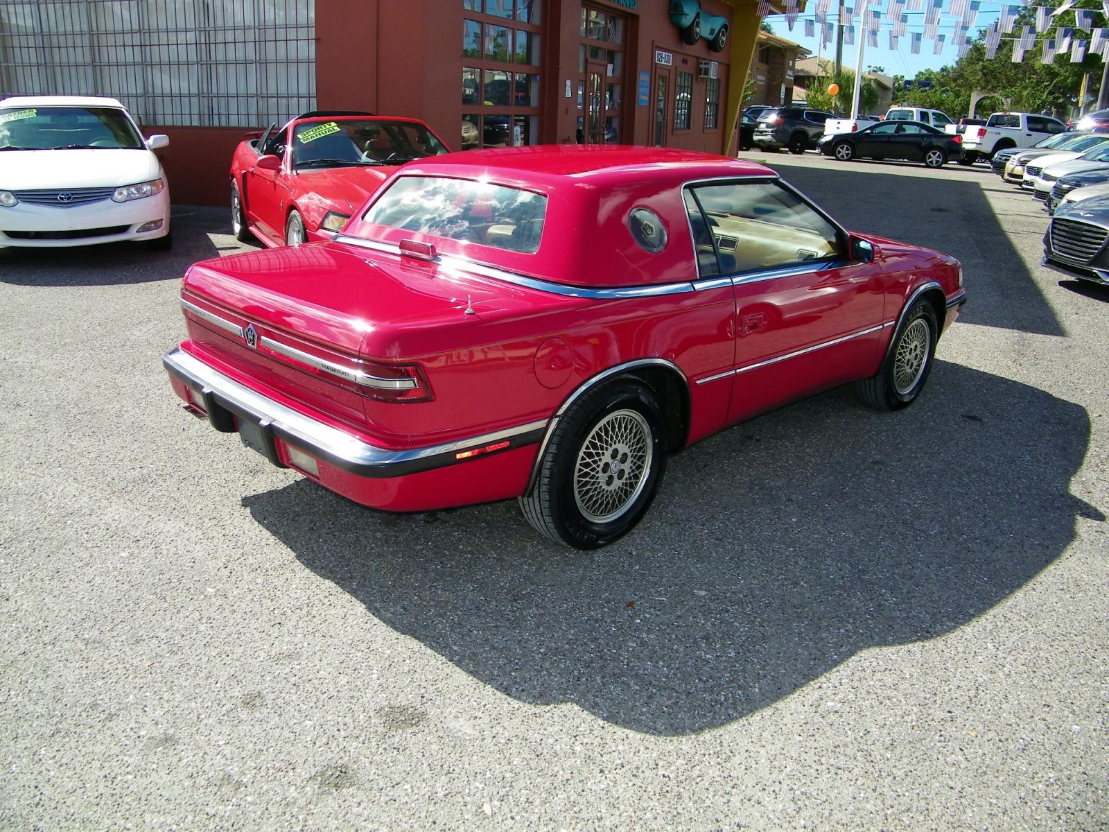 1991 Red /Beige Chrysler TC By Maserati Convertible (ZC2FS1207MB) with an 3.0L V6 SOHC 12V engine, 4-Speed Automatic Overdrive transmission, located at 4000 Bee Ridge Road, Sarasota, FL, 34233, (941) 926-0300, 27.298664, -82.489151 - Photo #4